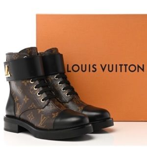 Authentic Louis Vuitton wonderland combat boots. Gently used. No damage. Size 8